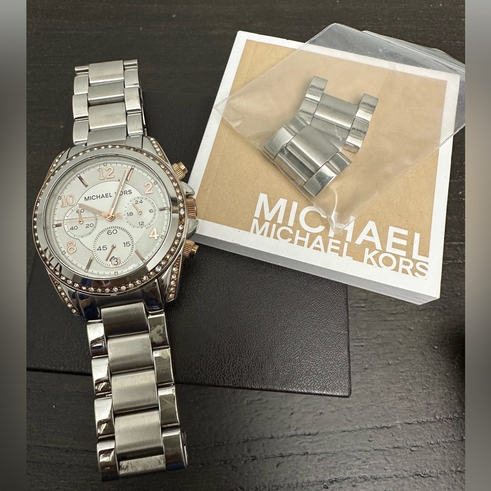 Michael Kors silver with rhinestone stones and gold accents